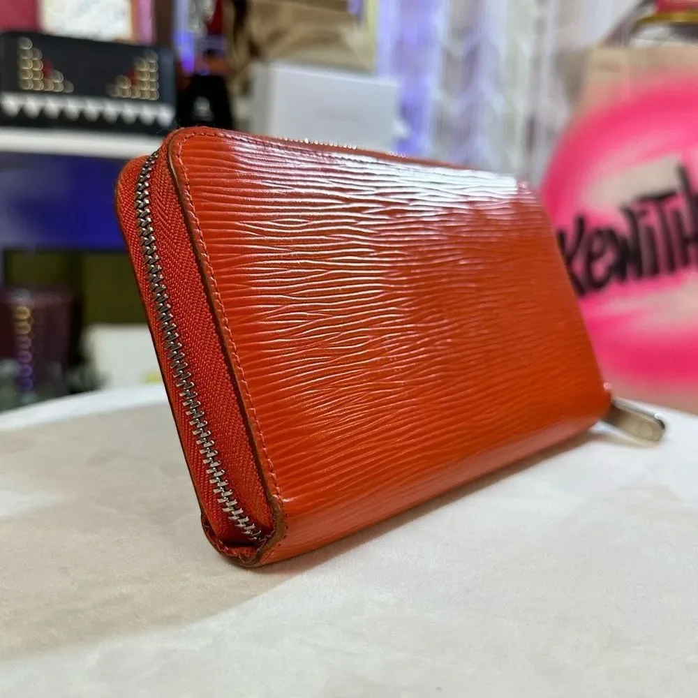 LOUIS VUITTON Long Wallet Epi Zippy Orange Women's Men's Leather